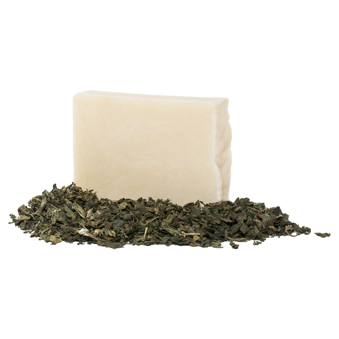 Nettle scented soap in a pile of nettles