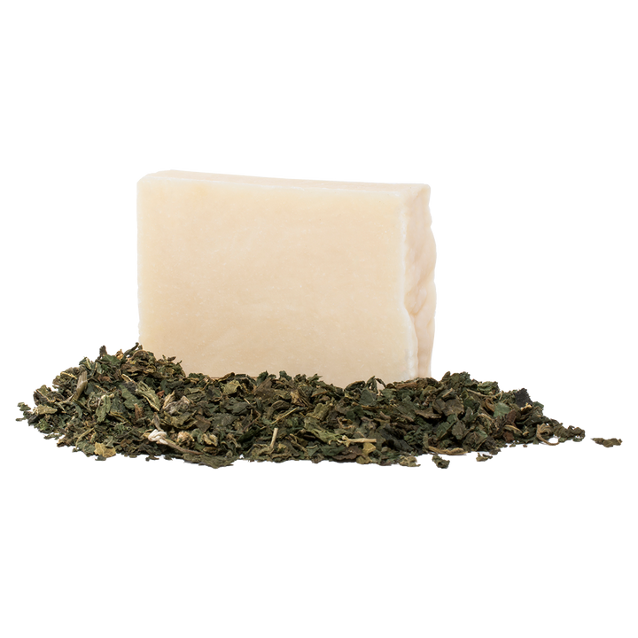 Nettle scented soap in a pile of nettles