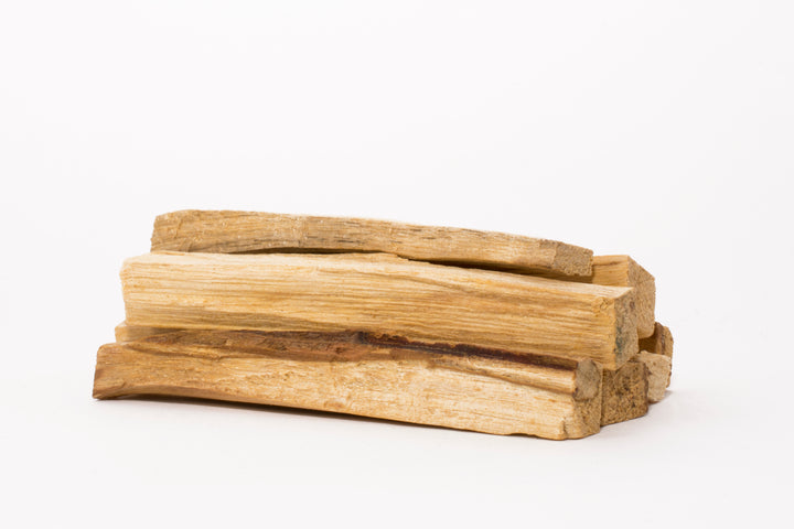 Pieces of Palo Santo stacked together