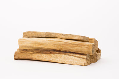 Pieces of Palo Santo stacked together