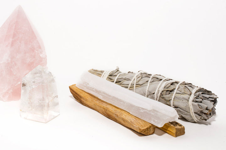 Sage, Palo Santo, Selenite, and Rose Quartz bundled together