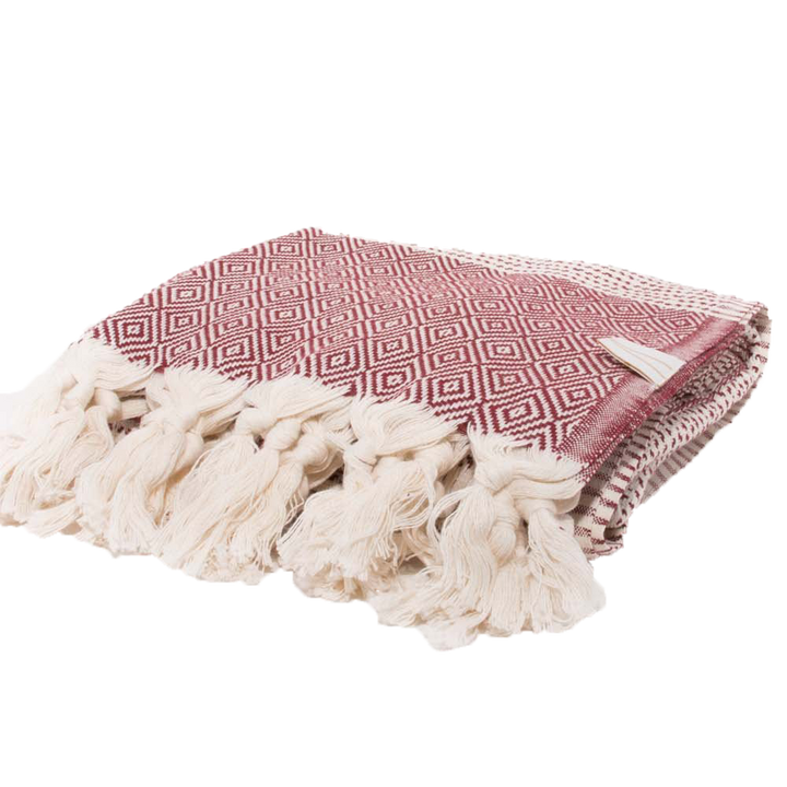 Folded red towel no background